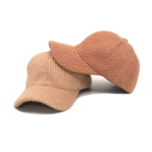 Winter knitted baseball caps in khaki and brick red with soft mohair texture