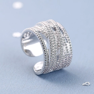 Sparkling wide multilayer wave ring with pavé cubic zirconia in silver finish