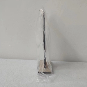 Close-up of a black metal display stand with a natural wooden base in clear packaging