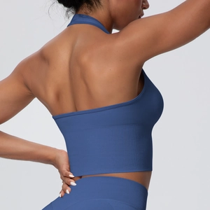 Detailed back view of dark blue halter yoga bra with ribbed hem and open back design