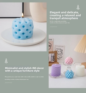 Detailed close-up of textured bubble and geometric pillar scented candles in pastel colors