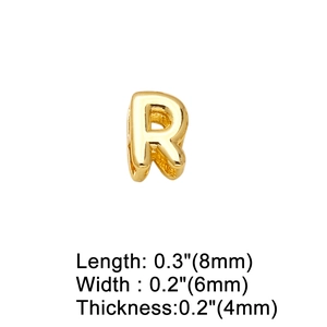 Macro view of 3D gold-plated letter R charm showing 8mm length and 6mm width dimensions
