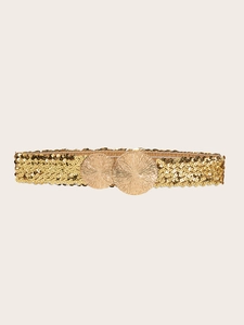 Close-up of golden sequin elastic waist belt with double round metal buckle for dresses