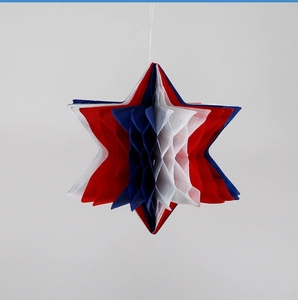 Detail of red white and blue paper honeycomb star ornament for Independence Day party decor