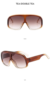Front and side view of oversized amber tortoiseshell sunglasses with gradient lenses