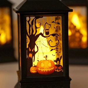 Halloween pumpkin LED lantern with spooky silhouette patterns for festive table decoration