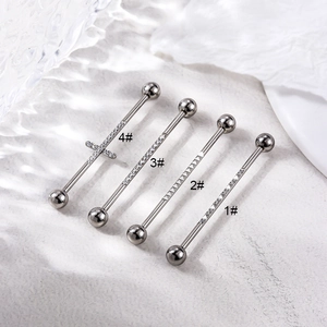 Four styles of stainless steel industrial barbells with cross and cubic zirconia designs