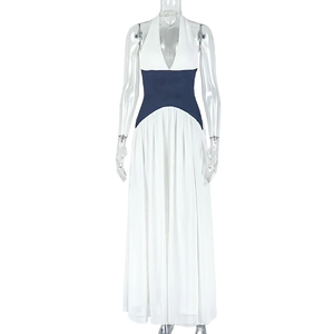 Detail of deep V-neck and pleated waist on this navy and white chiffon maxi dress