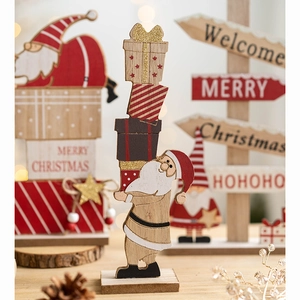 Creative wooden Santa Christmas desk ornament with Merry Christmas signage and warm lighting