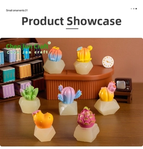 Miniature resin cactus and succulent decor on desk with tiny furniture accessories