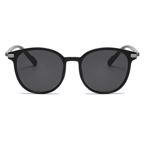 Classic black oversized round frame sunglasses with elegant silver metallic temple accents