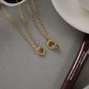 Classic 18K gold and silver two-tone interlocking heart and round pendant necklaces