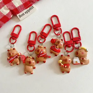 Set of 6 cute Capybara keychains with resin finish and red carabiner hooks for bags