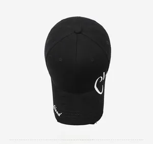 Detail showing distressed cotton fabric with Cloud embroidery and large C logo on the black cap