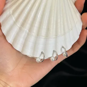 Artistic shell journal notebook with vintage aesthetic and white pearl shell cover design