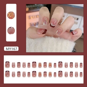 French gradient cat eye press-on nails with silver lines and glitter in deep red brown
