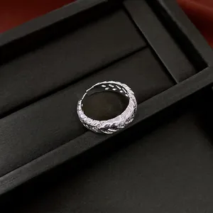 Elegant silver twisted rope open ring with minimalist woven texture and adjustable fit