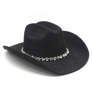 Close-up of black suede cowboy hat featuring a sparkling rhinestone decorative band