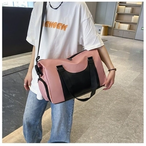 Pink and black large fitness bag with wet-dry separation and adjustable shoulder strap