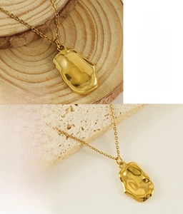 Irregular lava pendant necklace in 18K gold plated stainless steel with lead-free finish