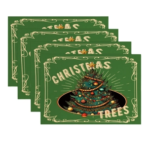 Set of four green Christmas tree table mats with festive lettering for dining decor