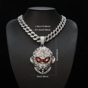 Silver iced out monkey king pendant on a thick cuban chain with detailed size markings