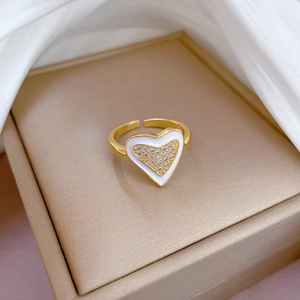 Adjustable gold open ring featuring a white enamel heart with sparkling zircon accents