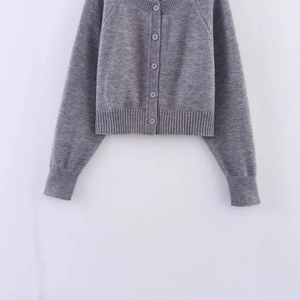 Classic dark grey cropped knitted cardigan with crew neck and button closure