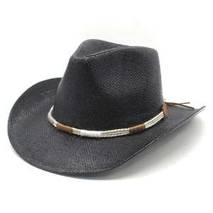 Classic black straw cowboy hat with wide brim and decorative multicolored woven cord