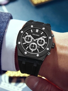 Wrist shot of black octagonal chronograph watch with waffle dial and rubber strap