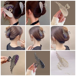 Detailed views of angel wing hair claws with rhinestones and cat eye beads on model