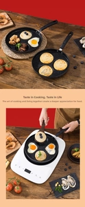 Detail view of four-hole non-stick Maifan stone egg frying pan on induction cooker
