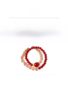 Détail d'un bracelet en perles d'agate rouge, cuivre et zircon de 34,6 cm de long