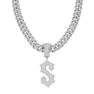 Hip hop silver Cuban link chain featuring an iced-out dollar sign $ pendant for men