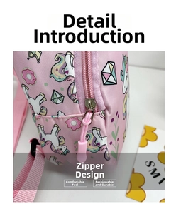 Detailed close-up of pink unicorn backpack showing durable metal zipper and zipper puller