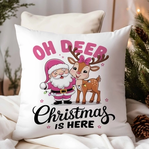 Close-up of Christmas pillow with Santa and deer patterns in a warm festive setting