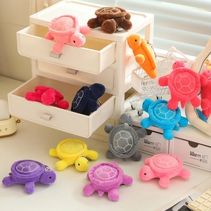 Colorful plush turtle keychains with metal clips and embroidered shell patterns