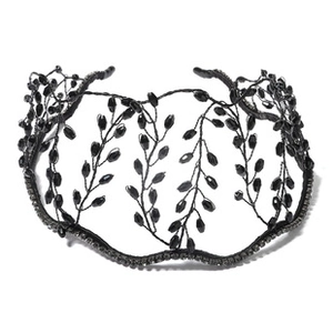 Detail of handcrafted black crystal beaded headband with Gothic leaf branch design