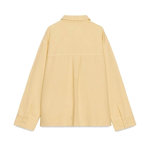 Pale yellow long sleeve shirt for women featuring a pleated back design on white background