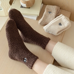 Warm coral fleece socks with cute eye embroidery in coffee and beige colors