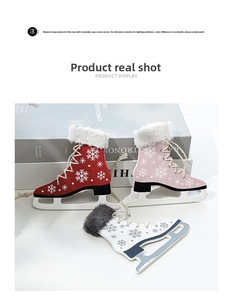 Detail view of wooden ice skate Christmas ornaments with snowflake patterns and faux fur trim