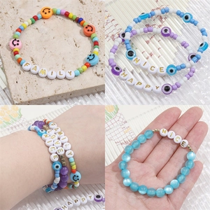 Handmade acrylic alphabet beads bracelet set with smiley face and evil eye charms