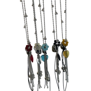 Five-piece layered tassel necklaces set with colorful flower beads and heart pendants