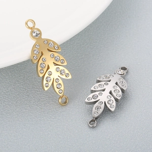 Gold and silver leaf pendants with sparkling crystals and vacuum plating