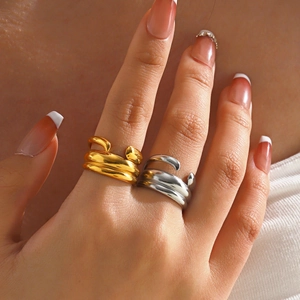 Minimalist 18K gold and silver chunky stainless steel open rings worn on fingers