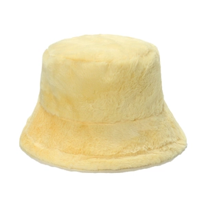 Close-up of soft faux rabbit fur texture on light yellow winter bucket hat