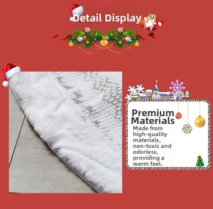 Detail of gray knitted 48-inch Christmas tree skirt with white plush trim and soft texture