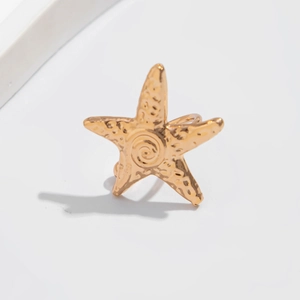 Elegant gold metallic starfish ear clip featuring a textured hammered finish for women