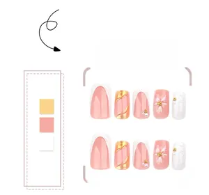 Detail of 3D sunflower press-on nails with French tips and pearl accents