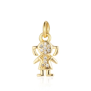 Close-up of a gold-plated girl pendant with sparkling zircon stones and a polished finish
